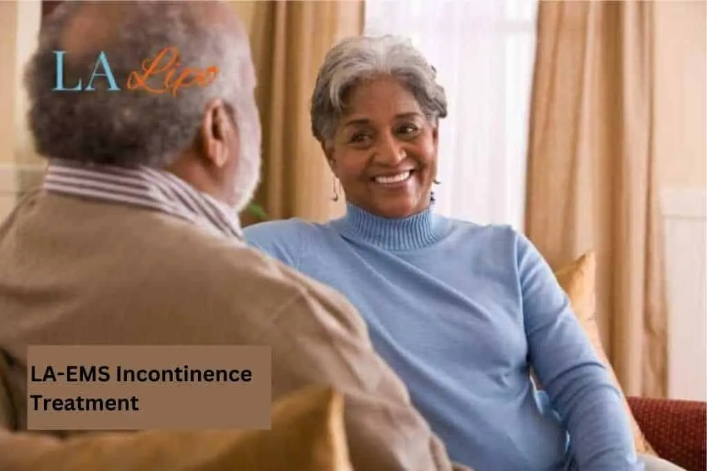 Couple sat smiling at each other - LA-EMS treatment Acton