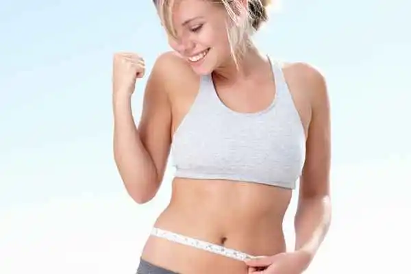 woman happy after fat reduction treatment Acton