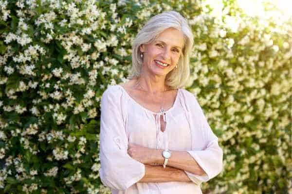 Older woman happy with urinary incontinence treatment Acton