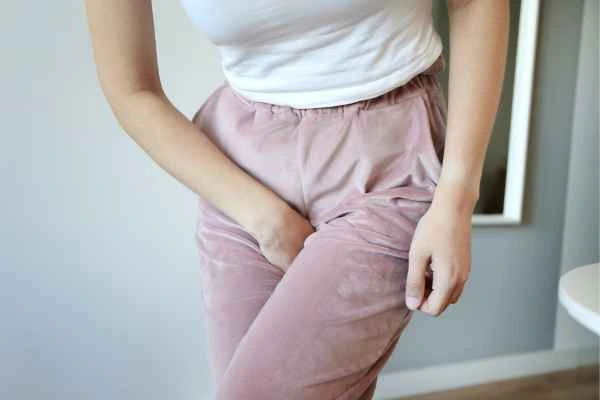 older woman running to the toilet because of urinary incontinence Acton